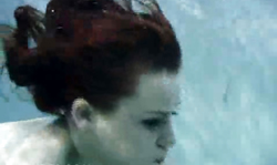 Redhead Babe With Red Lips Gives An Underwater Blowjob
