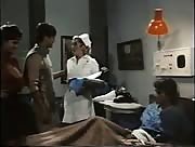 Vintage Porn Shows Off A Lucky Dude Getting Jerked Off By A Busty Nurse.