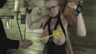 Old Woman With Big Boobs Is Getting Chained To An X Cross