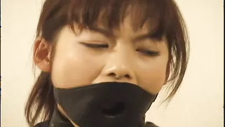 Dominated Japanese Schoolgirl Looks Nice In Black Blindfold