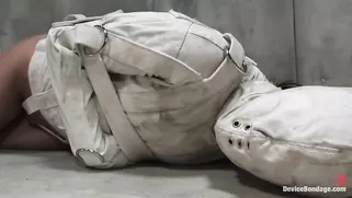 Tight White Straitjacket For A Screaming Brunette