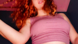 Redhead Curly Teen With Delicious Boobs Pretends To Ride A Guy’s Cock.