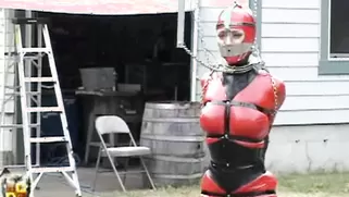 Pretty Slave With Big Tits In Tight Latex Costume Walks Around On High Heels