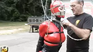 Pretty Slave With Big Tits In Tight Latex Costume Walks Around On High Heels