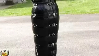 Gagged And Bound In Latex Bag Suit MILF Suffers