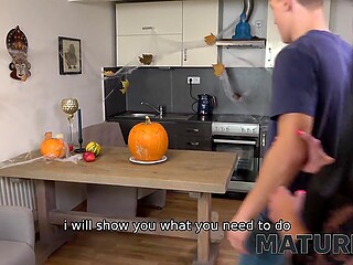 Mature Harlot In Black Exposes Her Immense Breasts To Seduce Her Stepson On Halloween Fucking