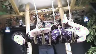 Awesome Chick In Long Blue Dress Is Trying Air Bondage