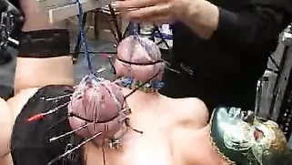 Brutal Master Impales Her Huge Boobies With Long Metal Needles