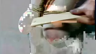 Curly MILF With Bounded Tits Enjoys Pain And Torturing